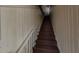 Classic staircase with wooden steps and white railing leading to the upper floors at 125 Ashley Ave, Charleston, SC 29401