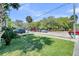 Serene street view featuring green space, mature trees, and charming neighborhood at 125 Ashley Ave, Charleston, SC 29401