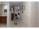 Hallway with tile flooring leading to the kitchen, bathroom, and living room at 126 N Hwy 52, Moncks Corner, SC 29461
