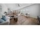 Open layout living room and dining area with natural light and hardwood floors at 1309 Berry Grove Dr, Summerville, SC 29485