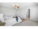 Serene bedroom with neutral tones, plush carpeting, ceiling fan, and plenty of closet space at 1309 Berry Grove Dr, Summerville, SC 29485