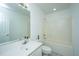 Well-lit bathroom featuring a bathtub, shower, sink, and vanity with neutral color palette at 1312 Belle Grove Cir, Hanahan, SC 29410