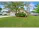 Charming single-story home with lush green lawn and mature landscaping at 1312 Belle Grove Cir, Hanahan, SC 29410