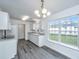Open kitchen featuring modern appliances and connecting breakfast nook at 1312 Belle Grove Cir, Hanahan, SC 29410