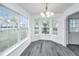 Bright breakfast nook with updated lighting and scenic backyard views at 1312 Belle Grove Cir, Hanahan, SC 29410
