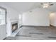 Cozy living room with a fireplace and stylish floors, perfect for relaxation at 1312 Belle Grove Cir, Hanahan, SC 29410