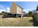 Spacious backyard with a patio, a gazebo, and mature landscaping at 138 Sandshell Dr, Charleston, SC 29492