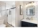 Modern bathroom with subway tile, stylish mirror, glass shower, and updated fixtures at 138 Sandshell Dr, Charleston, SC 29492