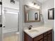 Modern bathroom with a vanity, framed mirror, and a separate shower and toilet area at 138 Sandshell Dr, Charleston, SC 29492