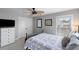 Cozy bedroom featuring a comfortable bed, natural light, and a ceiling fan at 138 Sandshell Dr, Charleston, SC 29492