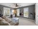 Comfortable bedroom featuring neutral walls, multiple windows, and a ceiling fan at 138 Sandshell Dr, Charleston, SC 29492