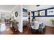 Charming dining room with stylish decor, hardwood floors, and seamless transition to other living spaces at 138 Sandshell Dr, Charleston, SC 29492
