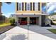 Spacious two-car garage featuring ample space for vehicles and storage at 138 Sandshell Dr, Charleston, SC 29492