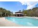 Community pool with an open pavilion that includes lots of seating and shelter from the sun at 138 Sandshell Dr, Charleston, SC 29492