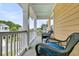 Inviting porch with comfortable seating, perfect for relaxing outdoors and enjoying neighborhood views at 138 Sandshell Dr, Charleston, SC 29492