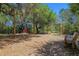 Community park with wooden swing sets and benches for relaxing at 138 Sandshell Dr, Charleston, SC 29492