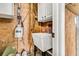 Unfinished utility room with sink and cabinet, providing a practical space for cleaning and storage at 138 Sandshell Dr, Charleston, SC 29492