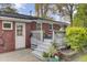 Backyard with a deck featuring potted plants and outdoor seating area at 1406 Iroquois St, North Charleston, SC 29405