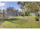 Spacious backyard with trampoline, shed, fire pit and outdoor seating at 1406 Iroquois St, North Charleston, SC 29405