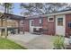 A backyard featuring a grill area with a covered structure and sink at 1406 Iroquois St, North Charleston, SC 29405