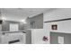 Bright bathroom features a soaking tub, tiled shower, and tasteful artwork at 1406 Iroquois St, North Charleston, SC 29405