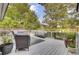 Inviting deck with comfortable seating, plants, and a relaxing hammock at 1406 Iroquois St, North Charleston, SC 29405