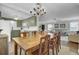 A warm, inviting dining room connects to the kitchen and living room, perfect for entertaining guests at 1406 Iroquois St, North Charleston, SC 29405