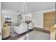 Open living area features hardwood floors, comfortable seating, and a dining area at 1406 Iroquois St, North Charleston, SC 29405