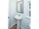 Powder room with pedestal sink and window at 143 Brant Dr, Summerville, SC 29483