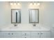 Bathroom with dual sinks, vanity, and mirrors at 143 Brant Dr, Summerville, SC 29483