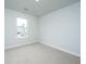 Sunlit bedroom offering neutral walls and plush carpet at 143 Brant Dr, Summerville, SC 29483