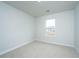 Bright bedroom with natural light, neutral walls, and plush carpeting at 143 Brant Dr, Summerville, SC 29483
