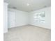 Bright, carpeted bedroom with a window bringing in lots of natural light at 143 Brant Dr, Summerville, SC 29483