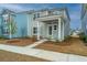 Well-kept two-story home featuring a welcoming covered porch and neat landscaping in a tranquil neighborhood at 143 Brant Dr, Summerville, SC 29483