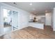 Open-concept kitchen and dining area with a sliding glass door to the patio at 143 Brant Dr, Summerville, SC 29483
