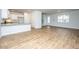 Spacious living area with beautiful hardwood flooring, ample natural light, and modern neutral paint at 143 Brant Dr, Summerville, SC 29483