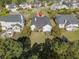 Aerial view showcasing the backyard featuring a swing set and trampoline at 1433 Oakhurst Dr, Mount Pleasant, SC 29466