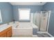 Bathroom featuring jacuzzi bathtub, walk-in shower, and tile flooring at 1433 Oakhurst Dr, Mount Pleasant, SC 29466