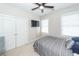 Bedroom featuring a ceiling fan, windows with blinds, and a TV on the wall at 1433 Oakhurst Dr, Mount Pleasant, SC 29466