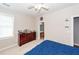 Cozy bedroom with a ceiling fan and a dark wood dresser, offering ample storage space at 1433 Oakhurst Dr, Mount Pleasant, SC 29466