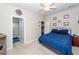 Bedroom showcasing artwork, a ceiling fan, and an ensuite bathroom at 1433 Oakhurst Dr, Mount Pleasant, SC 29466