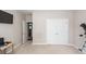 Bedroom with double doors and a view into another room. A telescope is on the floor at 1433 Oakhurst Dr, Mount Pleasant, SC 29466