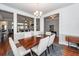 Open-concept dining area showcasing access to the living room and connecting rooms at 1433 Oakhurst Dr, Mount Pleasant, SC 29466