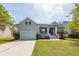 Beautiful two-story home with well manicured front yard and charming curb appeal at 1433 Oakhurst Dr, Mount Pleasant, SC 29466