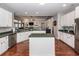 Spacious kitchen showcasing an island, white cabinetry, stainless steel appliances, and modern design at 1433 Oakhurst Dr, Mount Pleasant, SC 29466
