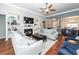 Comfortable living room with a fireplace, built-in shelves, and modern decor at 1433 Oakhurst Dr, Mount Pleasant, SC 29466