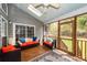 Relaxing screened porch featuring comfortable seating and lots of light at 1433 Oakhurst Dr, Mount Pleasant, SC 29466