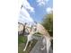 Bright backyard featuring playful dogs with ball at 1586 Innkeeper Ln, Johns Island, SC 29455