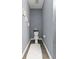 Neat half bathroom showing a textured wall, a toilet, and decor at 1586 Innkeeper Ln, Johns Island, SC 29455