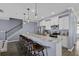 Modern kitchen features granite countertops and a breakfast bar with seating for four at 1586 Innkeeper Ln, Johns Island, SC 29455